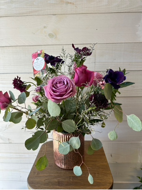 A rose bouquet with eucalyptus and a bit of wild feminine flare